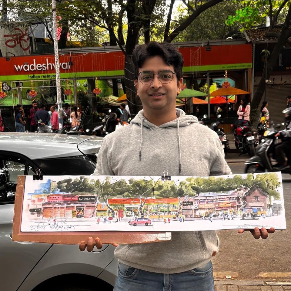 Artist with his work