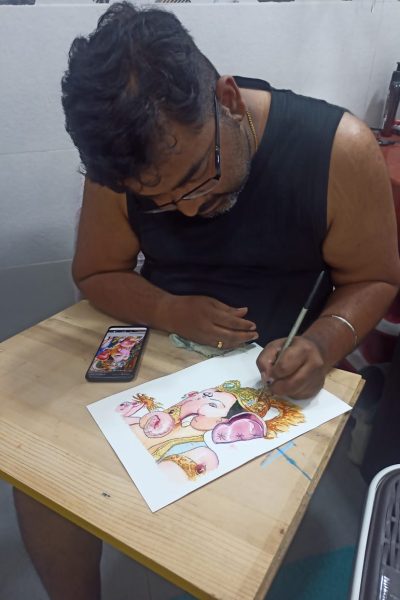 Artist making a painiting