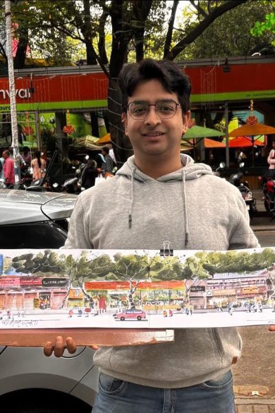 Artist with his work