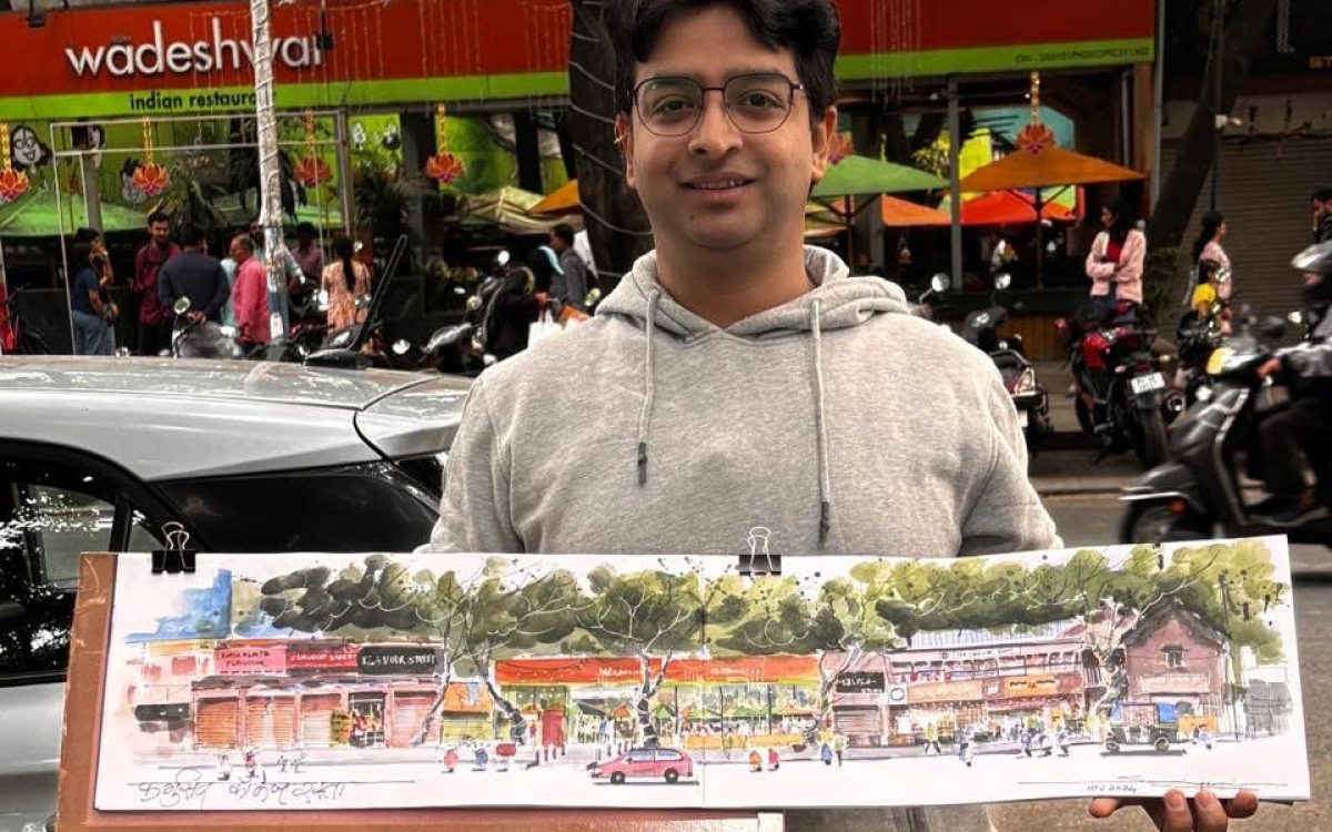 Artist with his work